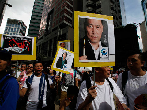 香港七一游行又成大杂烩 呼吁“真普选”、支持同性恋、保护动物同队游行